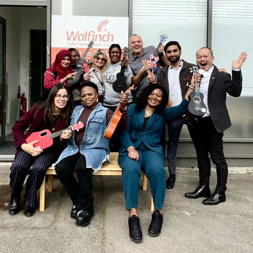 Walfinch team with ukuleles after workshop